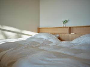 Ένα ή περισσότερα κρεβάτια σε δωμάτιο στο SANU 2nd Home 館山1st