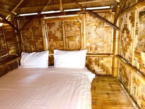 Postel nebo postele na pokoji v ubytování Patong Canal House