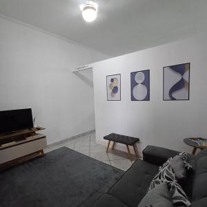 TV a/nebo společenská místnost v ubytování Aconchego GG