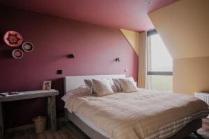 Ένα ή περισσότερα κρεβάτια σε δωμάτιο στο Ferme Baliolo +83 φωτογραφίες