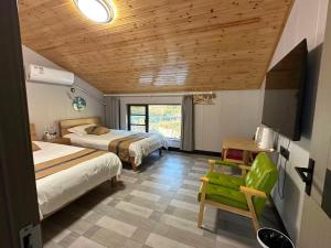 Postel nebo postele na pokoji v ubytování Tonglu Hemingge Homestay + 226 fotografií