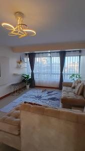 Χώρος καθιστικού στο Belaire BnB Syokimau