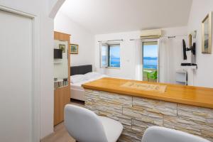 TV a/nebo společenská místnost v ubytování Villa Marevista