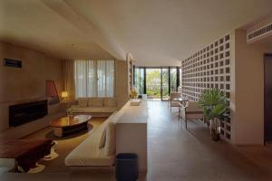 TV a/nebo společenská místnost v ubytování REVE HOUSE inn