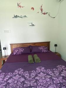 Ένα ή περισσότερα κρεβάτια σε δωμάτιο στο Nature River Villa