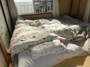 Postel nebo postele na pokoji v ubytování YabFarm Lodge 201