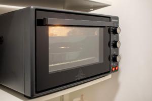 Η κουζίνα ή μικρή κουζίνα στο Jacuzzi - Il Centro Luxury Suites