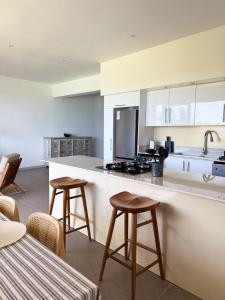 Kuchyň nebo kuchyňský kout v ubytování Lorlagon by LOV Mauritius