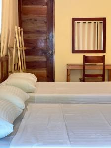 Postel nebo postele na pokoji v ubytování Boracay Amor Apartment (Garden)