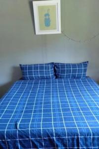 Postel nebo postele na pokoji v ubytování Farm house map of africa