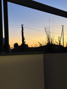 Východ nebo západ slunce při pohledu z penzionu nebo okolí