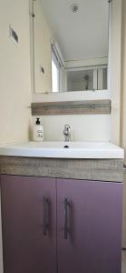 Koupelna v ubytování LAS CABAÑAS DEL LAGO En temporada incluye acceso piscina Las 2 columnas!