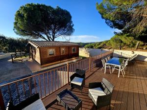 Balkón nebo terasa v ubytování LAS CABAÑAS DEL LAGO En temporada incluye acceso piscina Las 2 columnas!