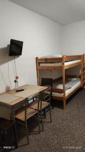 Postel nebo postele na pokoji v ubytování Apartmány Růže