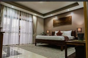 Ένα ή περισσότερα κρεβάτια σε δωμάτιο στο Rosettes Boutique Hotel +3 φωτογραφίες