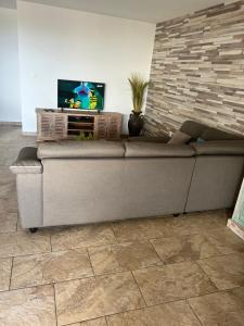 TV a/nebo společenská místnost v ubytování F3 panoramique l horizon