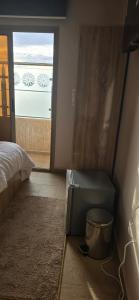 Ένα ή περισσότερα κρεβάτια σε δωμάτιο στο Complexe derhem traiteur