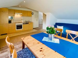 Kuchyň nebo kuchyňský kout v ubytování Villa Fortuna Haupthaus II OG links