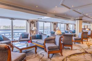 a large living room with couches and chairs at Sonesta St George Nile Cruise - Luxor to Aswan 4 Nights from Monday to Friday in Luxor