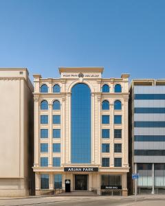 a large building with an arch in front of it at فندق ارجان بارك جدة in Jeddah
