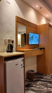 Η κουζίνα ή μικρή κουζίνα στο فندق القصواء-AlQaswaa Hotel