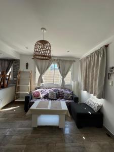 Ένα ή περισσότερα κρεβάτια σε δωμάτιο στο Complejo Santa Ana Miramar Buenos Aires