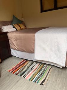 Ένα ή περισσότερα κρεβάτια σε δωμάτιο στο Sunwich Beach Home