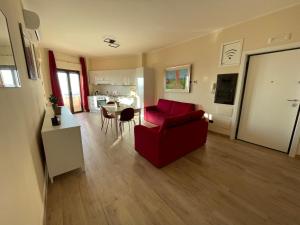 TV a/nebo společenská místnost v ubytování Casa Viale Kennedy