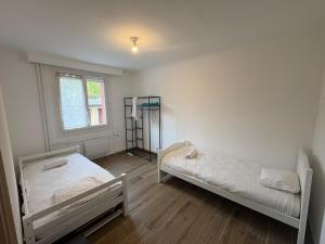 Ένα ή περισσότερα κρεβάτια σε δωμάτιο στο le be good