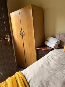 Ένα ή περισσότερα κρεβάτια σε δωμάτιο στο Sunwich Beach Home