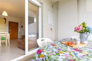 Et opholdsområde på Appartamento Zara 3 - MyHo Casa