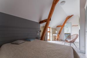 Postel nebo postele na pokoji v ubytování Le Moulin de Touvois 15p Bourgueil piscine + 73 fotografií