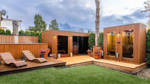 Κήπος έξω από το Aparthotel Delta Zakopane