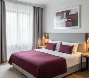 Postel nebo postele na pokoji v ubytování Kara Apart 53 + 16 fotografií