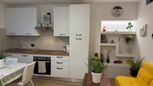 Kuchyň nebo kuchyňský kout v ubytování Appartamento moderno a Borgo Valsugana + 6 fotografií