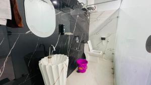 Koupelna v ubytování Rk Paying Guest House + 8 fotografií