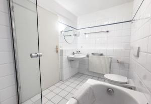 Koupelna v ubytování 33 - 4 Hotelkamer voor 2 gasten op de begane grond