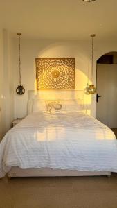 Postel nebo postele na pokoji v ubytování Beachfront Apartment Sabinillas