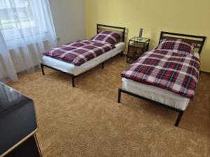 Ένα ή περισσότερα κρεβάτια σε δωμάτιο στο Werreufer 2 Schlafzimmer