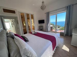 Postel nebo postele na pokoji v ubytování MARVELOUS SEA VIEW VILLA