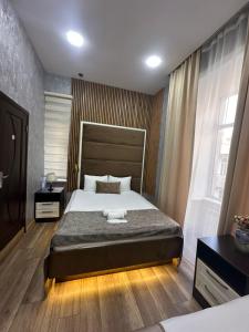Postel nebo postele na pokoji v ubytování Baku City INN