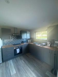 Kuchyň nebo kuchyňský kout v ubytování Zara’s retreat