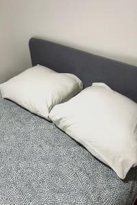 Ένα ή περισσότερα κρεβάτια σε δωμάτιο στο Charming apartment on the Saône Quays