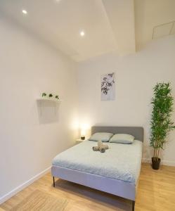 Ένα ή περισσότερα κρεβάτια σε δωμάτιο στο Charming apartment on the Saône Quays