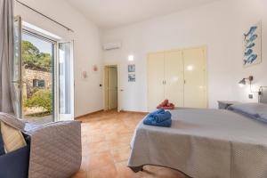 Ένα ή περισσότερα κρεβάτια σε δωμάτιο στο Villa degli Archi
