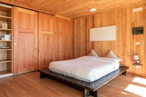 Ένα ή περισσότερα κρεβάτια σε δωμάτιο στο Borgata Paraloup