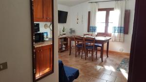 Kuchyň nebo kuchyňský kout v ubytování La PAVONCELLA 1