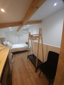 Ένα ή περισσότερα κρεβάτια σε δωμάτιο στο Duplex design +4 φωτογραφίες