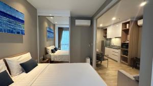 Postel nebo postele na pokoji v ubytování Diamond Phuket Bang Tao + 22 fotografií