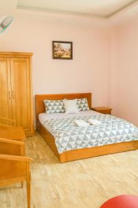 Postel nebo postele na pokoji v ubytování Thảo Nguyên 2 Hotel + 21 fotografií